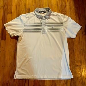 Large Travis Mathew polo with Kapalua logo on sleeve